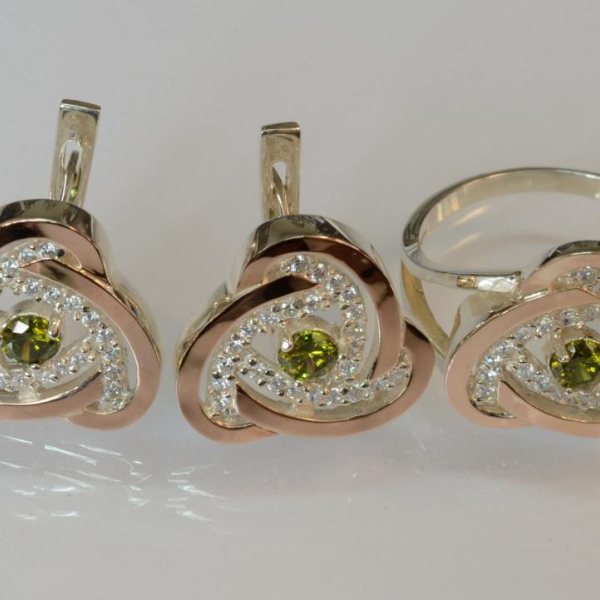 Срібний набір з золотими пластинами