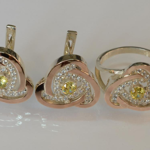 Срібний набір з золотими пластинами