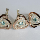 Срібний набір з золотими пластинами