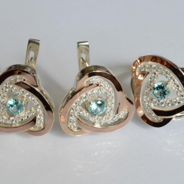 Срібний набір з золотими пластинами