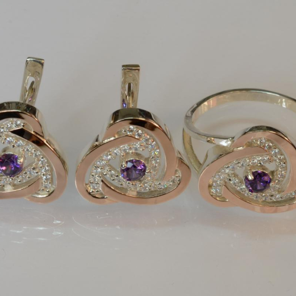 Срібний набір з золотими пластинами