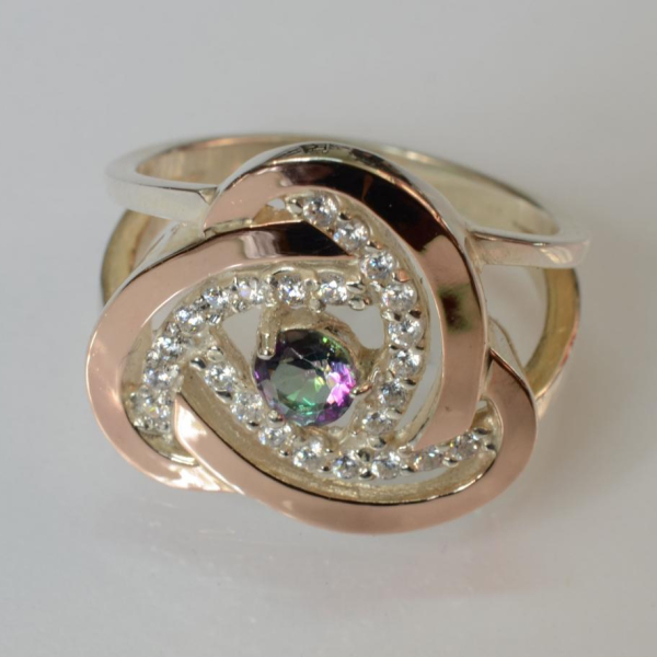 Срібна каблучка з золотими вставками