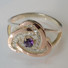 Срібна каблучка з золотими вставками