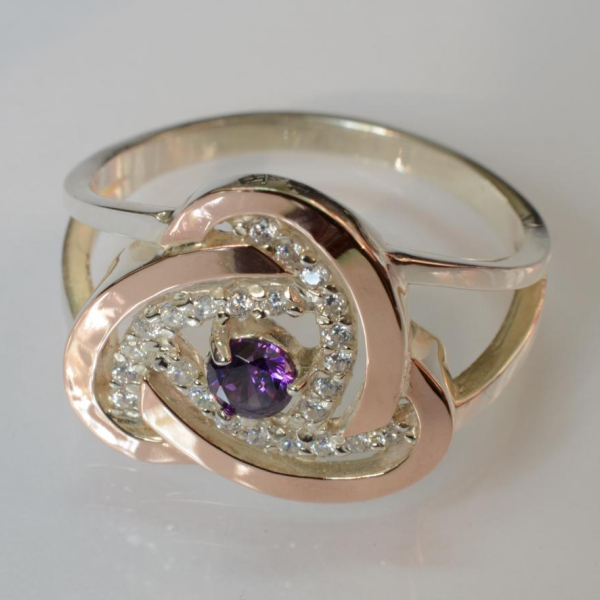 Срібна каблучка з золотими вставками