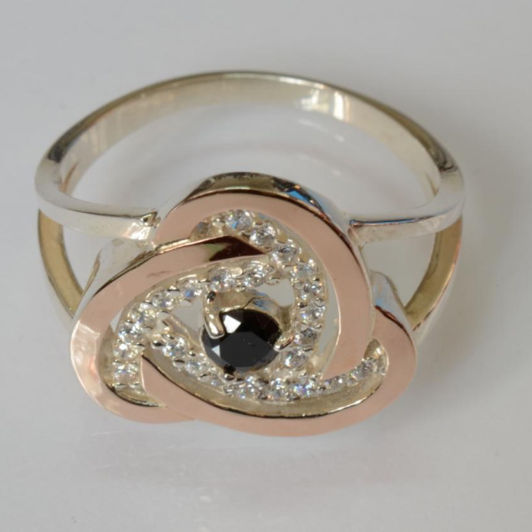 Срібна каблучка з золотими вставками