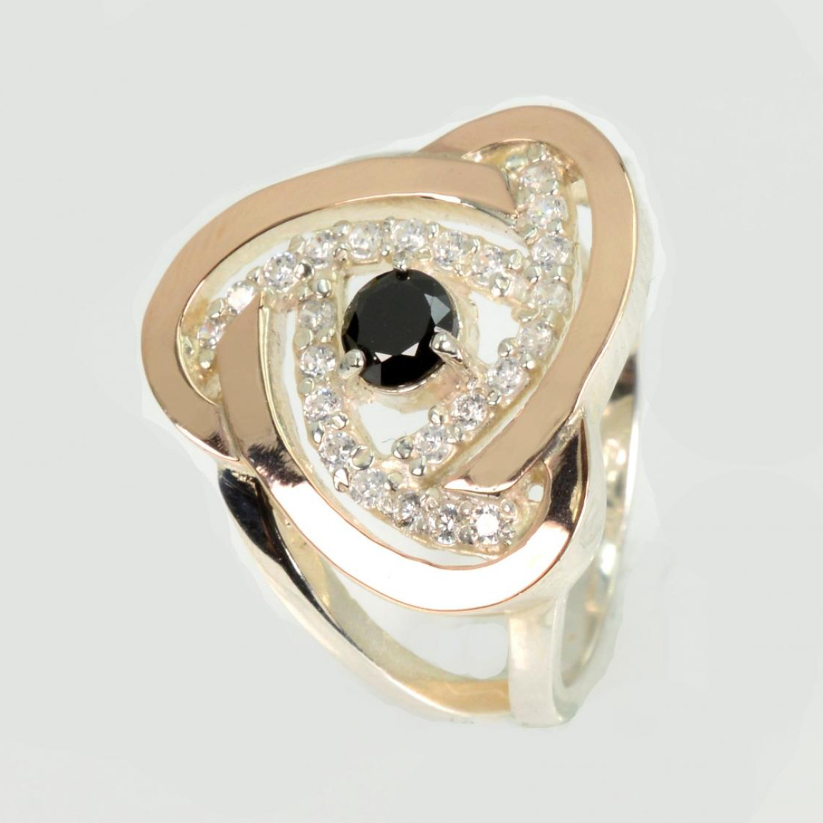 Срібна каблучка з золотими вставками