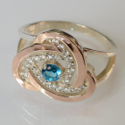 Срібна каблучка з золотими вставками