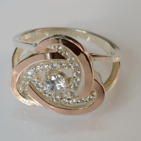 Срібна каблучка з золотими вставками