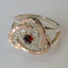 Срібна каблучка з золотими вставками