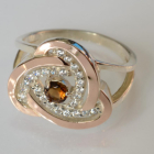 Срібна каблучка з золотими вставками