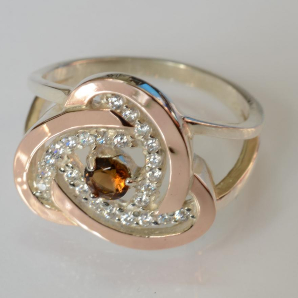 Срібна каблучка з золотими вставками