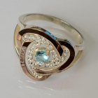 Срібна каблучка з золотими вставками