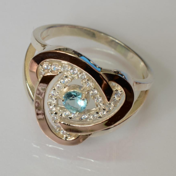 Срібна каблучка з золотими вставками