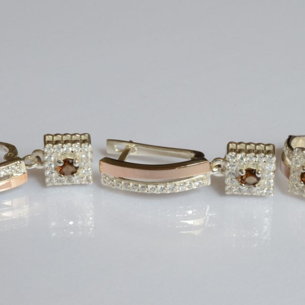 Срібний набір з золотими пластинами