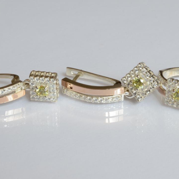 Срібний набір з золотими пластинами