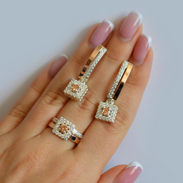 Срібний набір з золотими пластинами