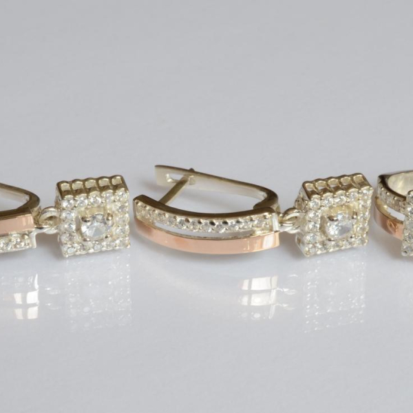 Срібний набір з золотими пластинами