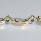 Срібний набір з золотими пластинами