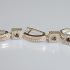 Срібний набір з золотими пластинами