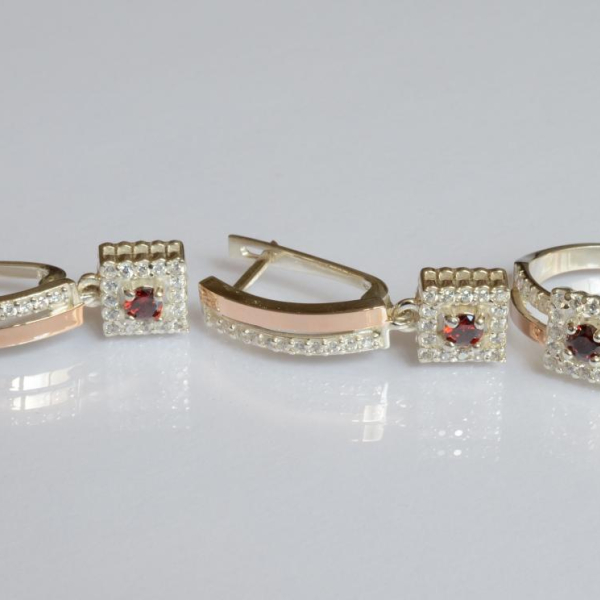 Срібний набір з золотими пластинами