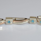 Срібний набір з золотими пластинами