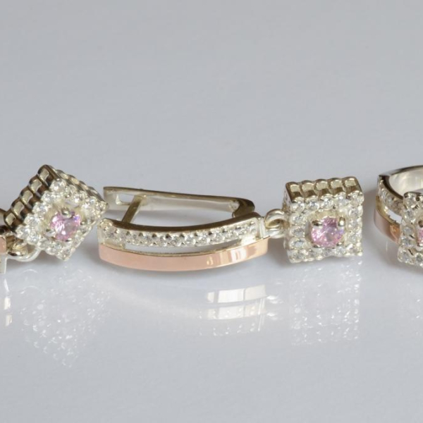 Срібний набір з золотими пластинами