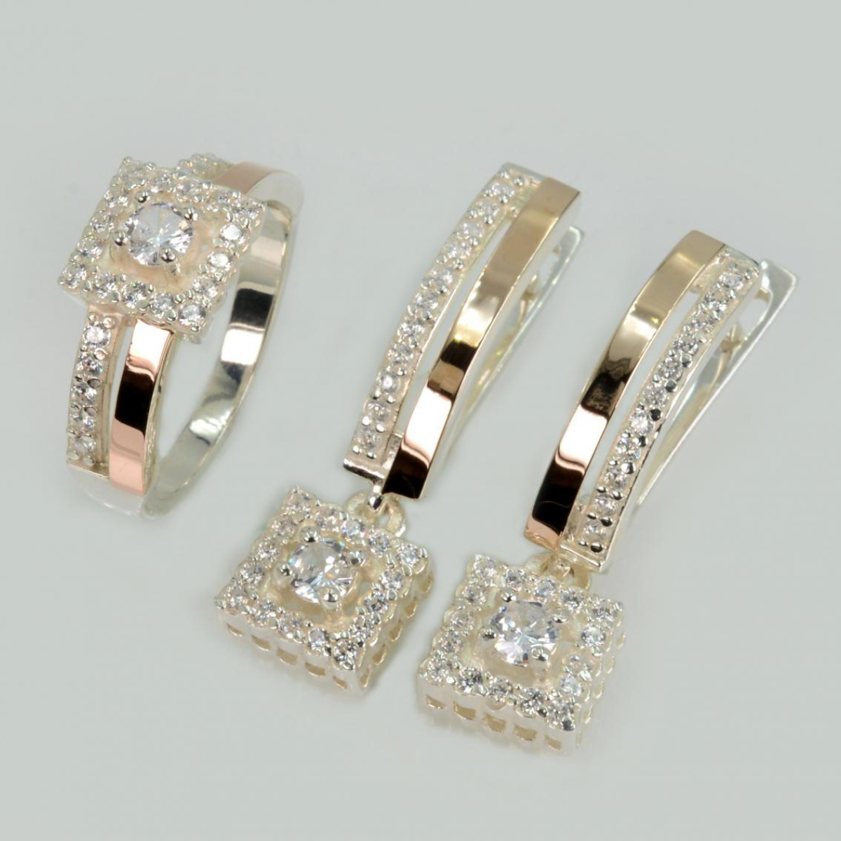 Срібний набір з золотими пластинами