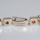 Срібний набір з золотими пластинами