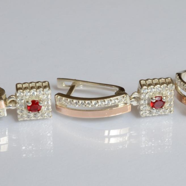 Срібний набір з золотими пластинами