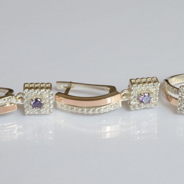 Срібний набір з золотими пластинами