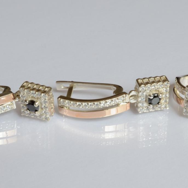 Срібний набір з золотими пластинами