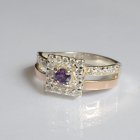 Срібна каблучка з золотими вставками