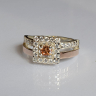 Срібна каблучка з золотими вставками