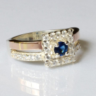 Срібна каблучка з золотими вставками