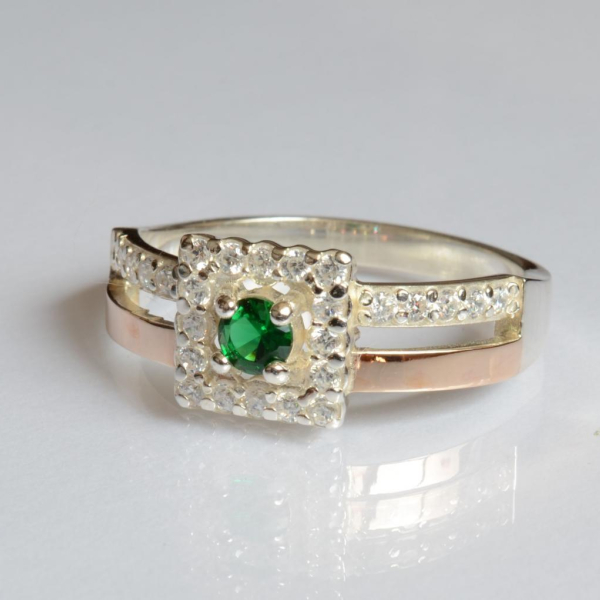 Срібна каблучка з золотими вставками