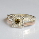 Срібна каблучка з золотими вставками