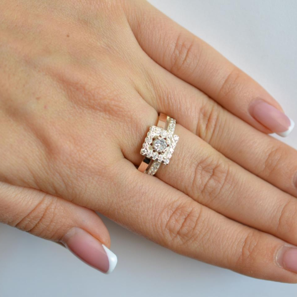 Срібна каблучка з золотими вставками