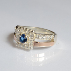 Срібна каблучка з золотими вставками