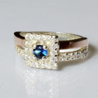 Срібна каблучка з золотими вставками