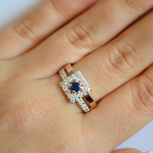 Срібна каблучка з золотими вставками