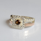 Срібна каблучка з золотими вставками