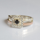 Срібна каблучка з золотими вставками