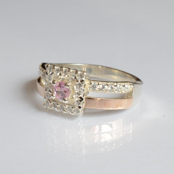 Срібна каблучка з золотими вставками