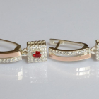 Срібні сережки з золотими пластинами