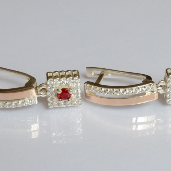 Срібні сережки з золотими пластинами