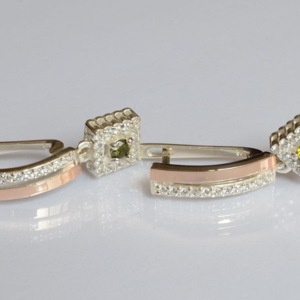 Срібні сережки з золотими пластинами