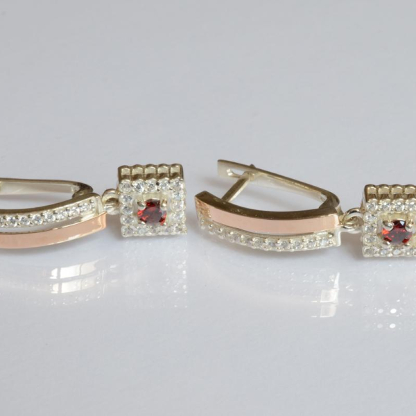 Срібні сережки з золотими пластинами