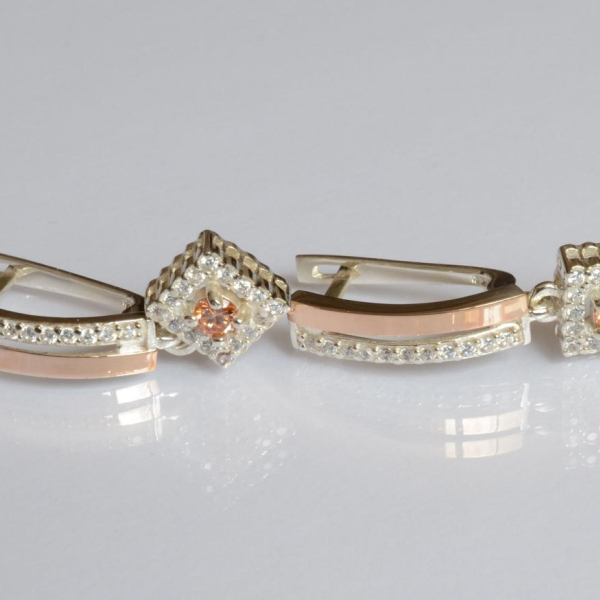 Срібні сережки з золотими пластинами