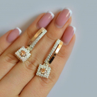 Срібні сережки з золотими пластинами