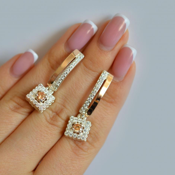 Срібні сережки з золотими пластинами